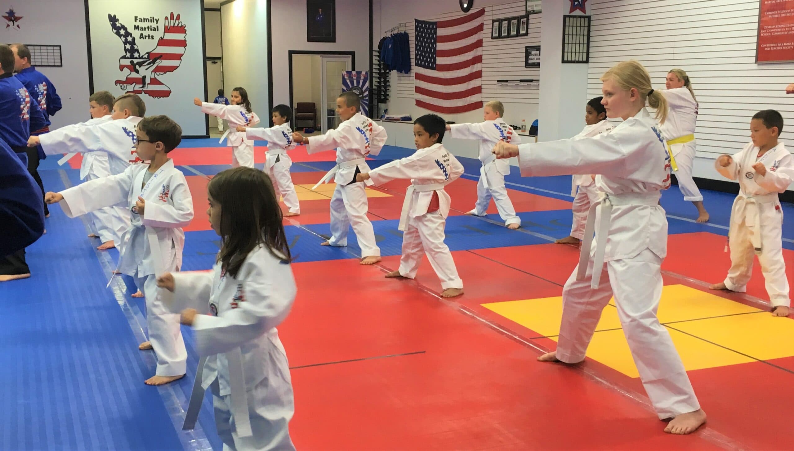 Kids in class on the dojo floor